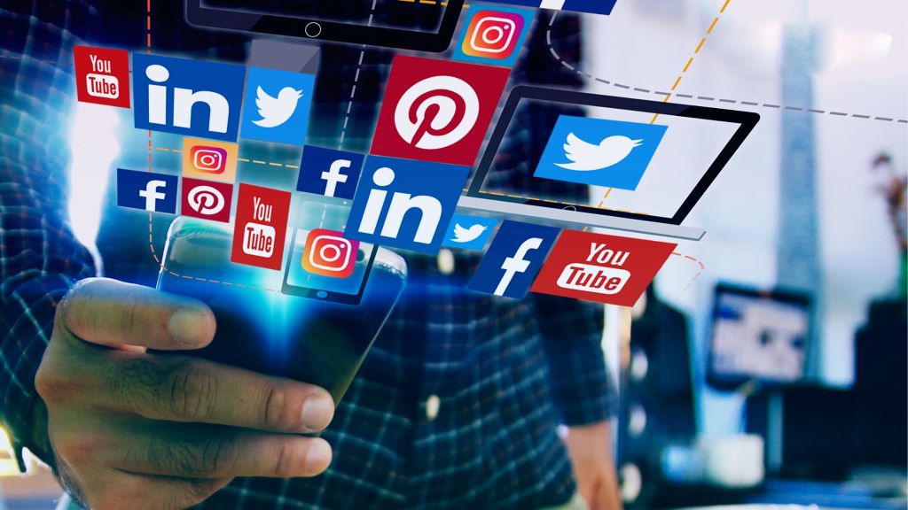 Entrepreneur analyzing viral content performance across multiple platforms in 2026
